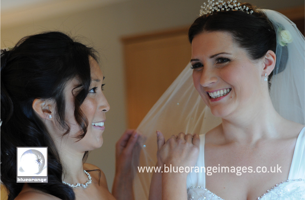 Chrissie & Jon’s wedding photos at Hunton Park, Watford – getting ready with the bridesmaid