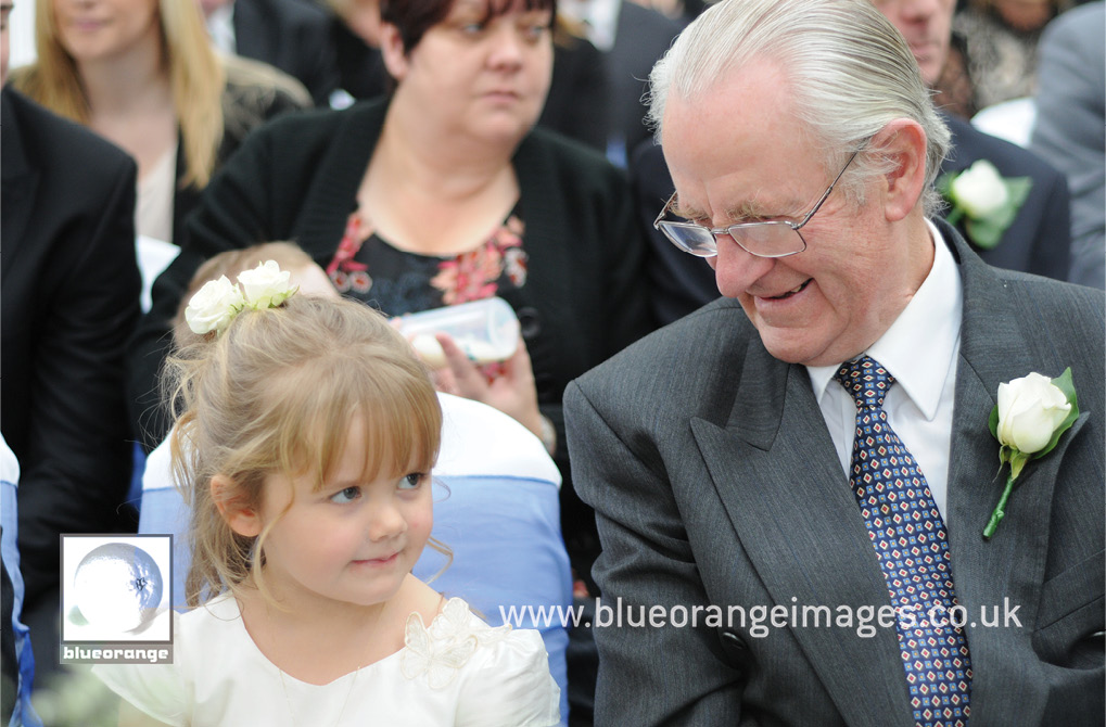 Father of the groom, with grand daughter, and Chrissie & Jon’s wedding. Hunton Park, Watford