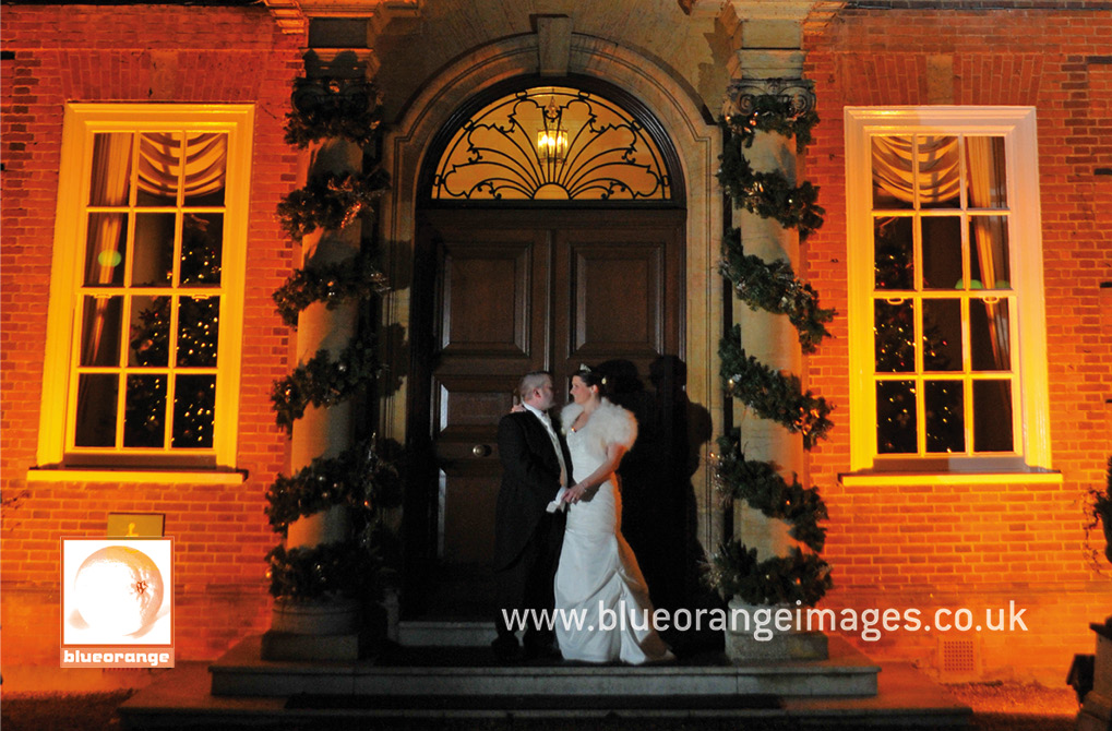 Wedding at Hunton Park venue – the bride and groom at the amazing and elegant main entrance