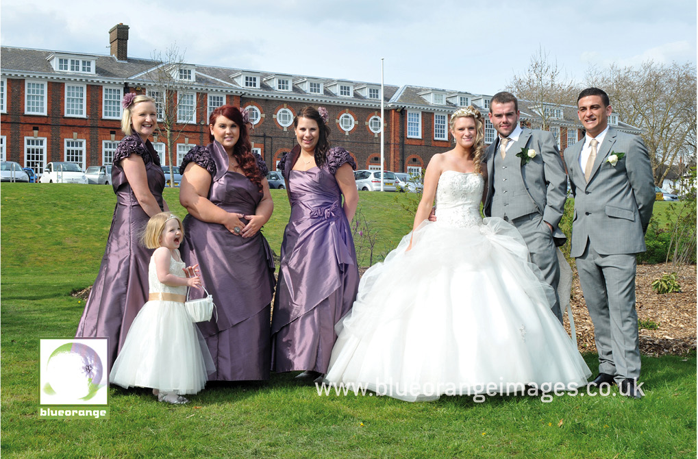 The bride, groom, bridesmaids, flower girl & best man