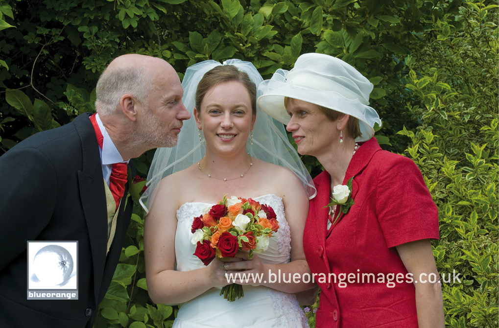 The bride and parents, before the wedding