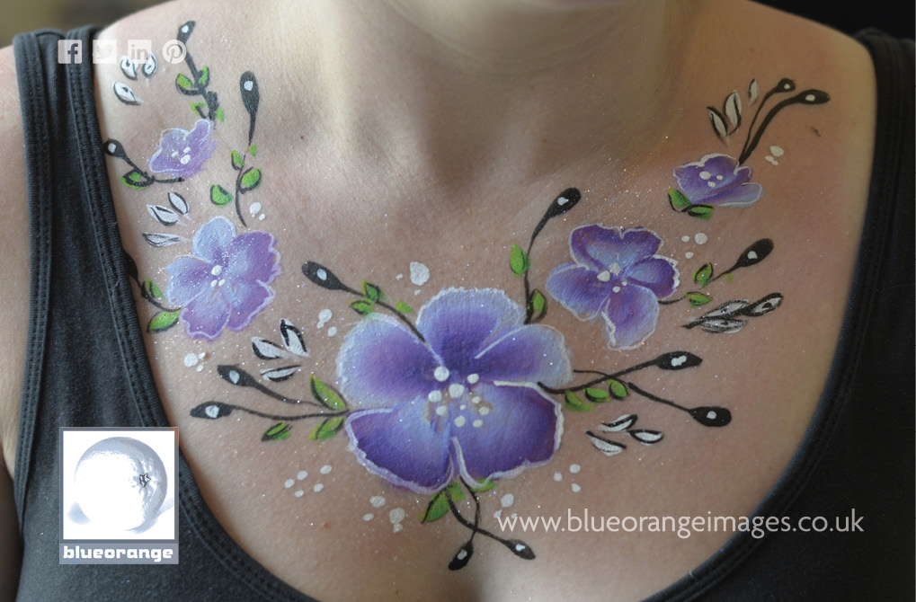 Blue flower face painting designs from Blue Orange Images Photographs, Watford