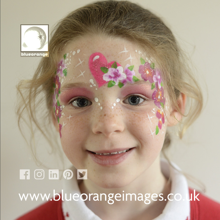 Face painting hearts & flower design, Blue Orange Images, Abbots Langley, Herts WD5