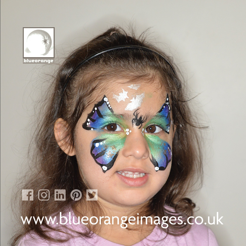 Butterfly glitter face painting design, Blue Orange Images, Abbots Langley, Herts